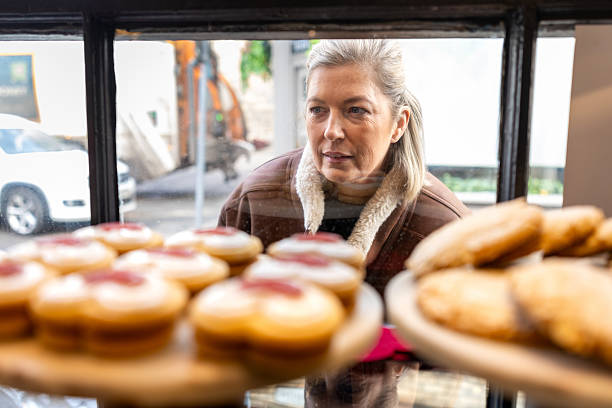 Bakery window display with cakes and cookies